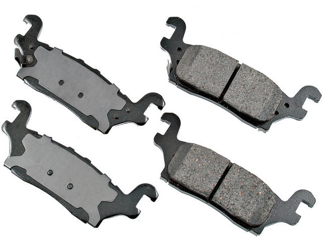 Rear Brake Pad Set - 2006-2010 Hummer H3 - Akebono 18605-05112986